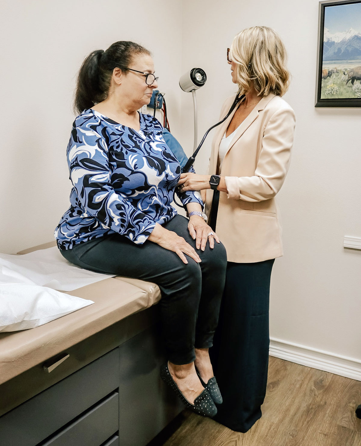 Physician reviewing medical information with a patient